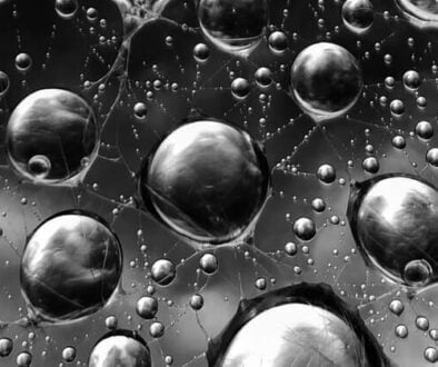 An image showing water droplets in black and white