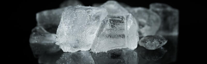 Ice Cubes on a dark surface